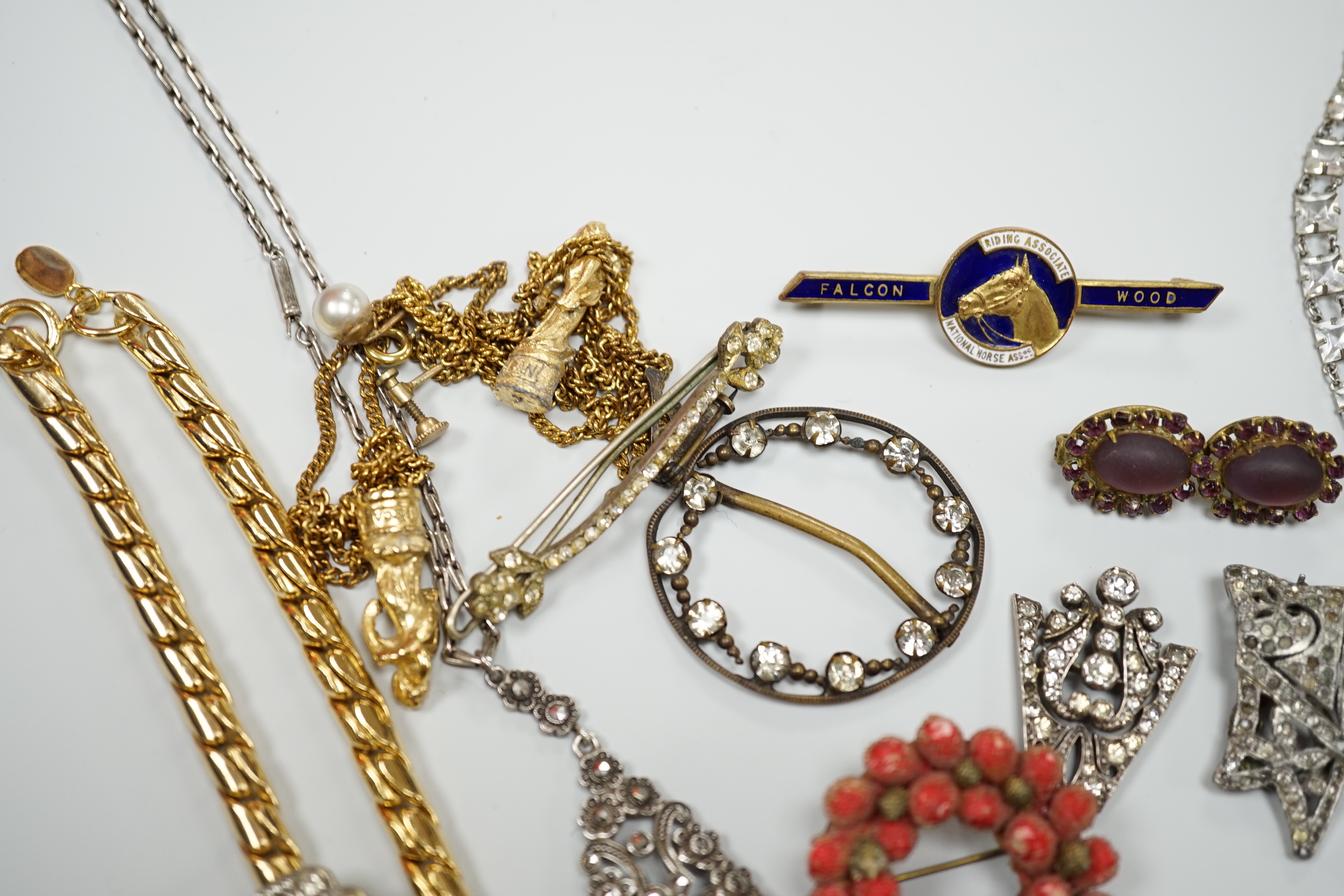 A small collection of assorted costume jewellery including a marcasite set pendant necklace.